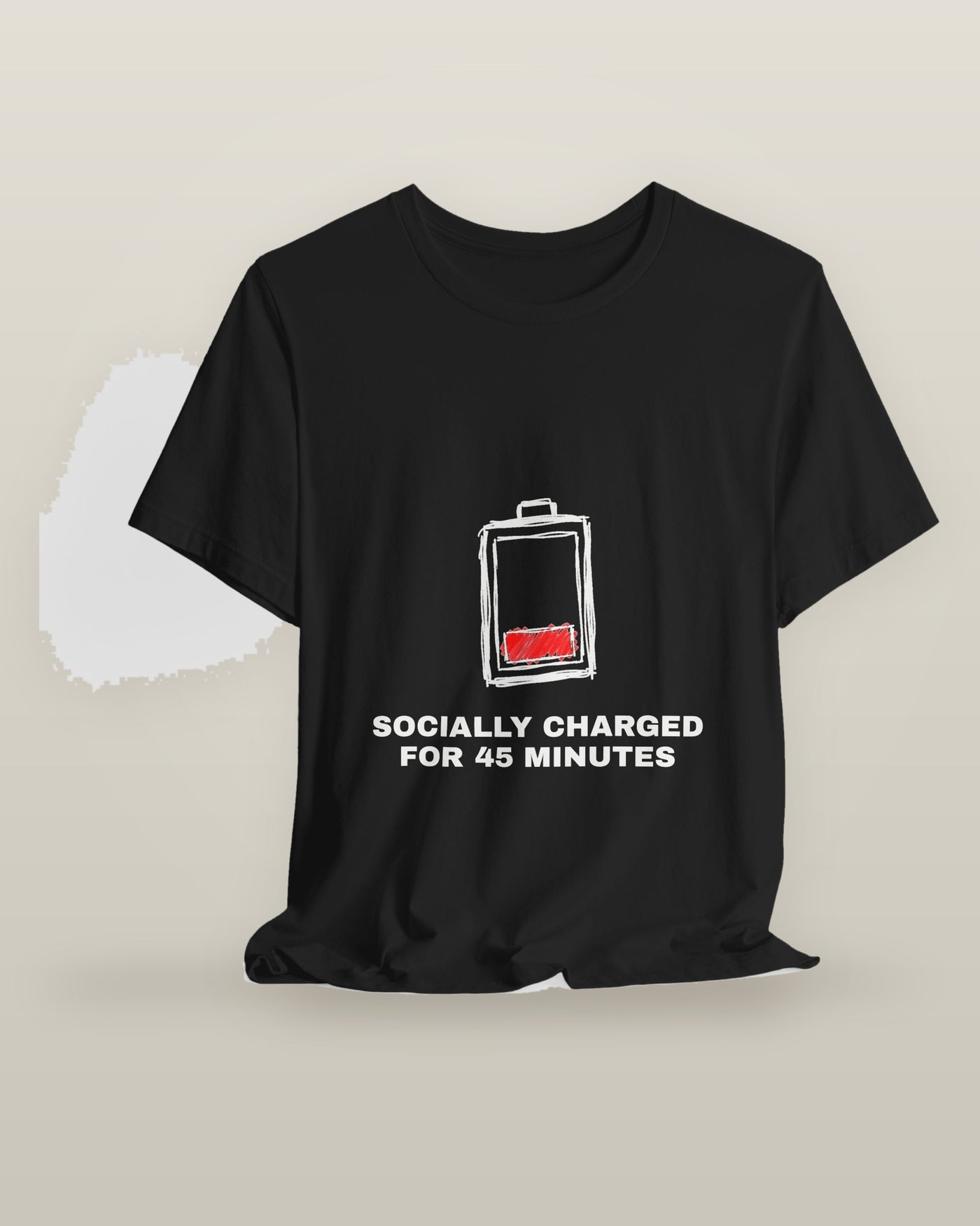 Socially charged for 45 minutes — a battery drained to its last bar, printed on a black cotton t-shirt, on a hanger
