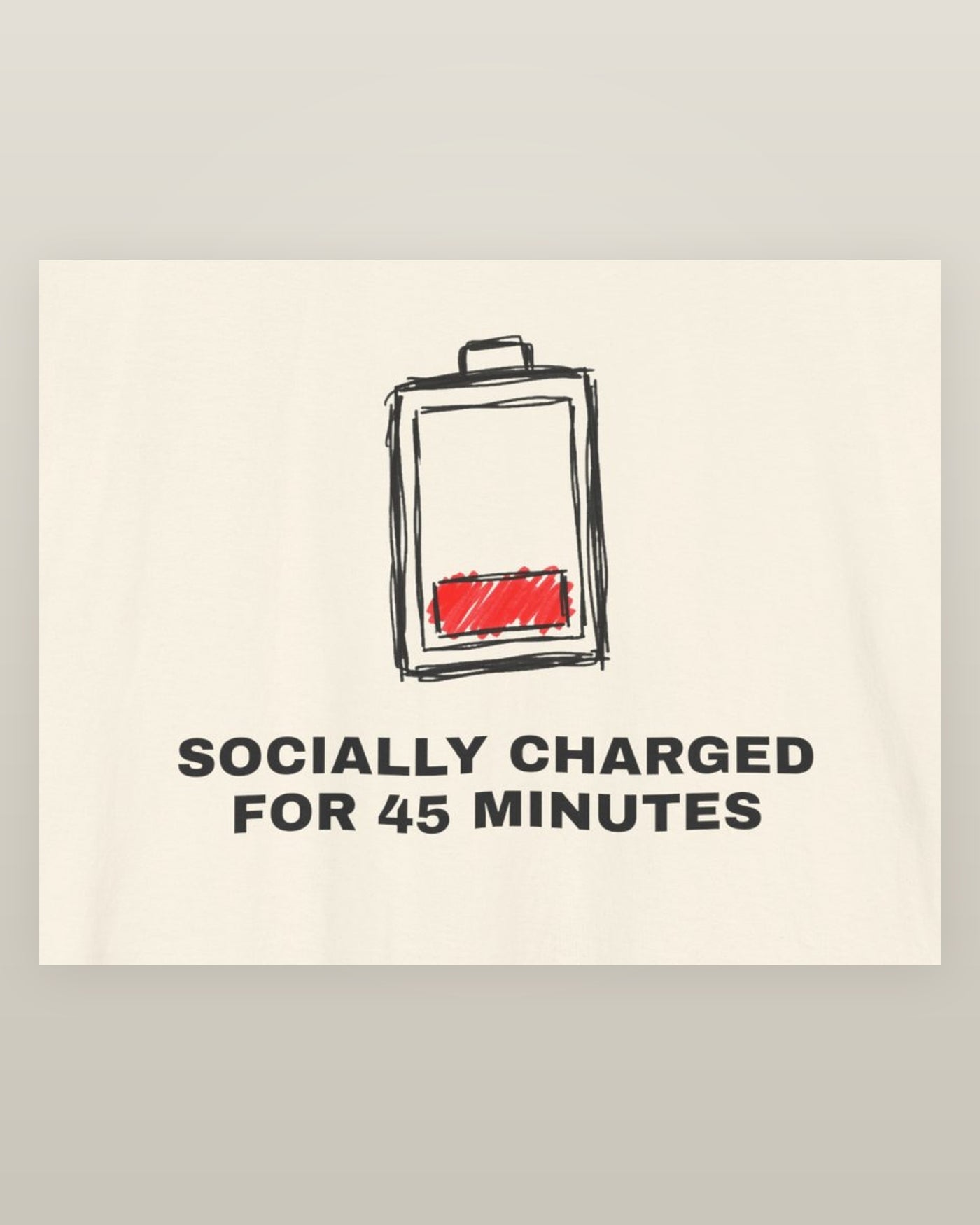 Socially charged for 45 minutes — a battery drained to its last bar, printed on a natural cream cotton t-shirt, close detail of the print