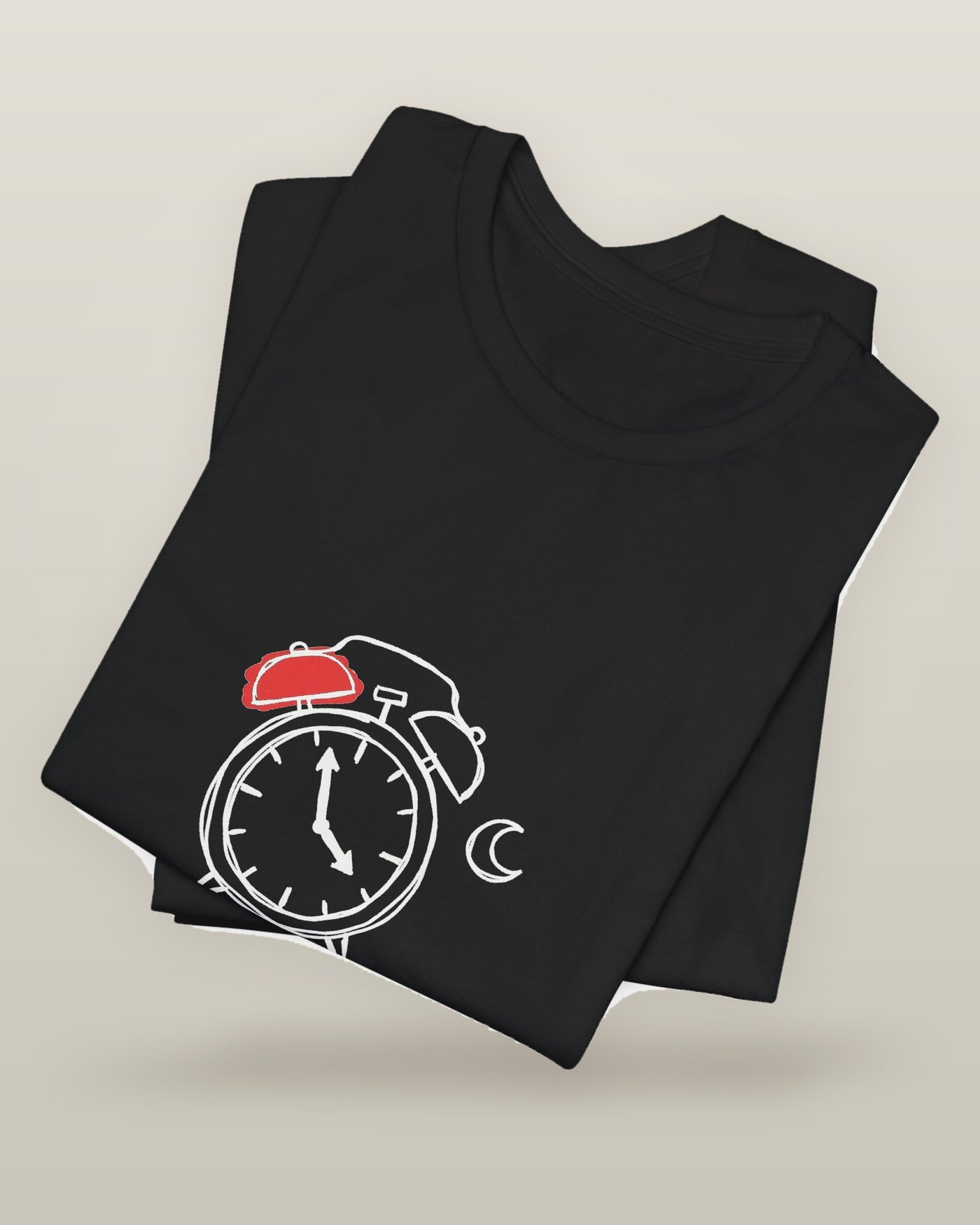 I could fix my sleep schedule. I won't. — an alarm clock at a very late hour beside a crescent moon, printed on a black cotton t-shirt, folded