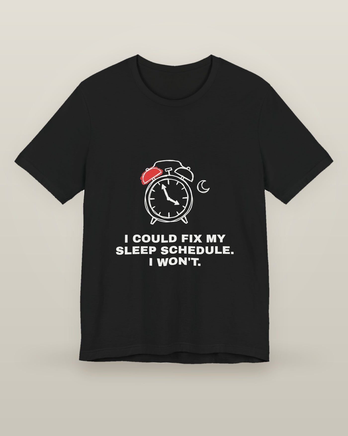 I could fix my sleep schedule. I won't. — an alarm clock at a very late hour beside a crescent moon, printed on a black cotton t-shirt, front view