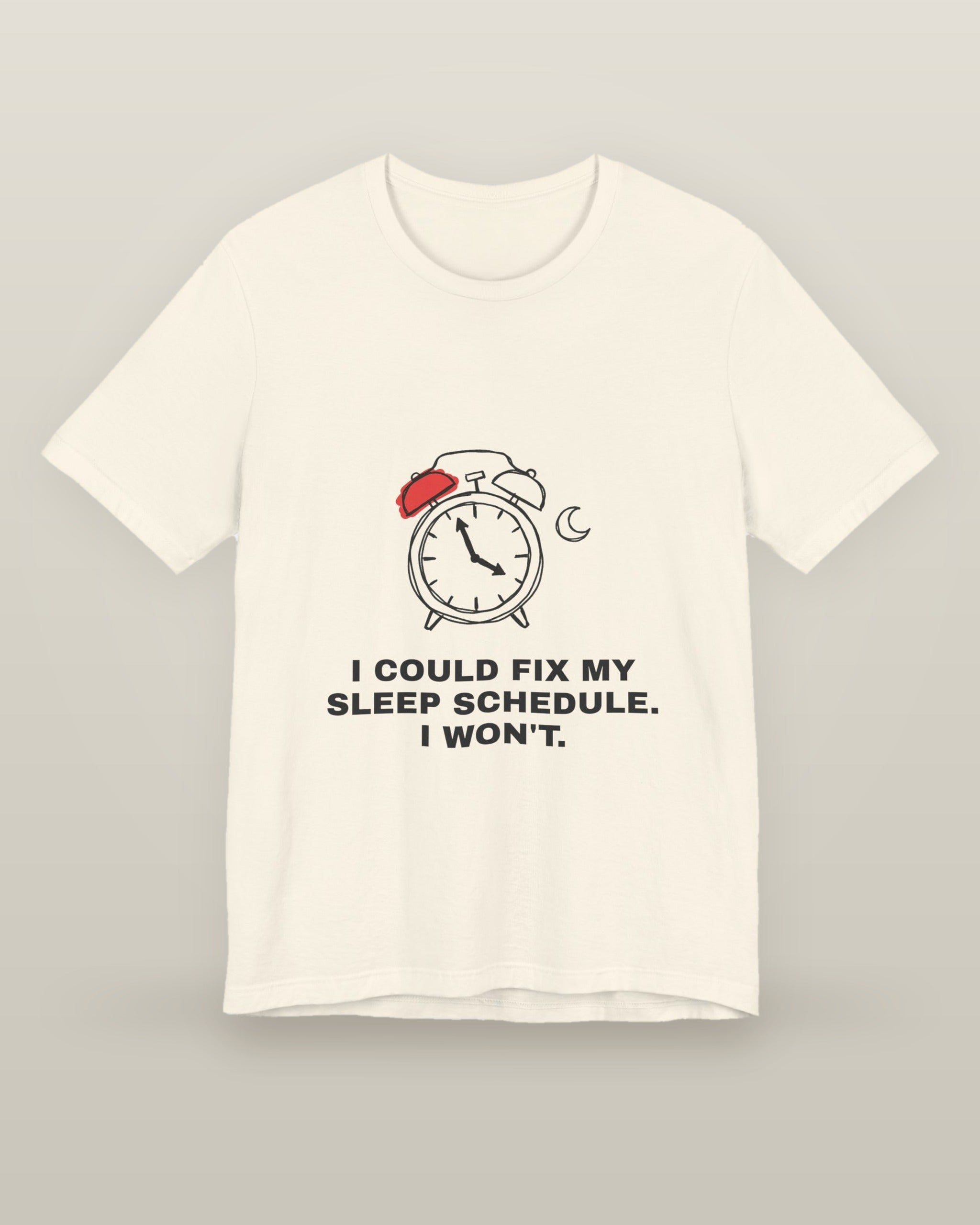 I could fix my sleep schedule. I won't. — an alarm clock at a very late hour beside a crescent moon, printed on a natural cream cotton t-shirt, front view