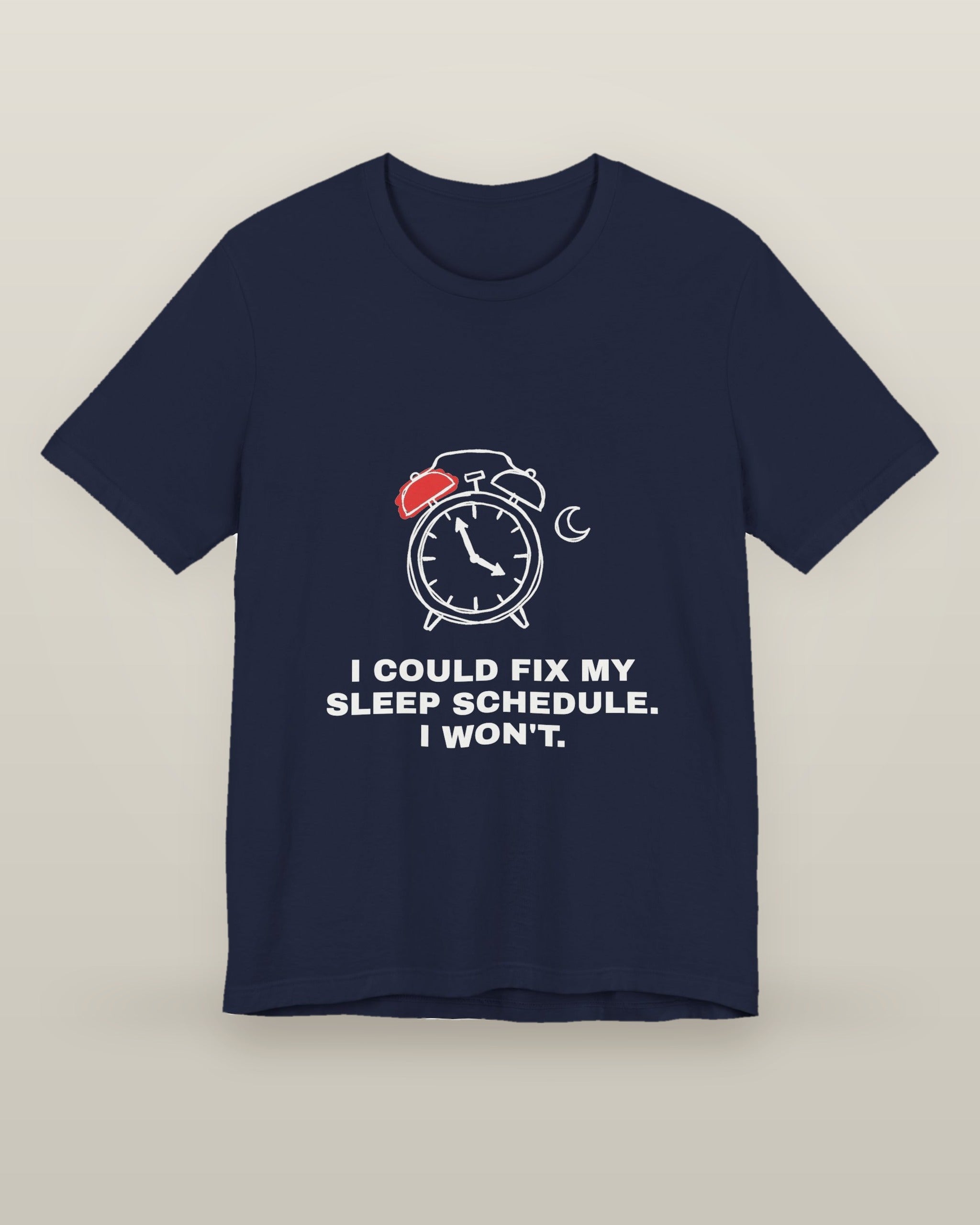 I could fix my sleep schedule. I won't. — an alarm clock at a very late hour beside a crescent moon, printed on a navy cotton t-shirt, front view