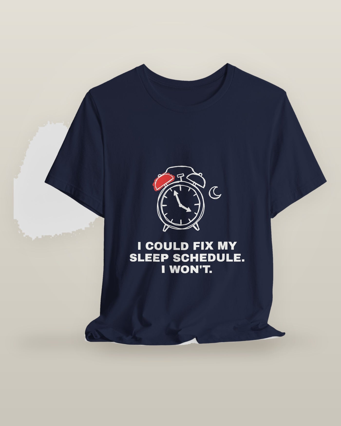 I could fix my sleep schedule. I won't. — an alarm clock at a very late hour beside a crescent moon, printed on a navy cotton t-shirt, on a hanger