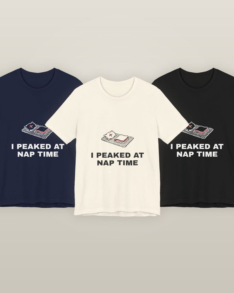 I peaked at nap time — a floor nap mat with a folded blanket and one pillow, printed on a natural cream, navy and black cotton t-shirt, all three colourways together